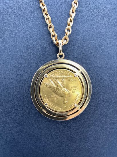 null 10 $ liberty 1910, pièce en or monté en pendentif avec une chaine en or jaune.

Poids...