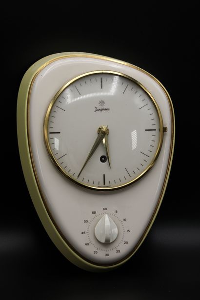null JUNGHANS Ceramic wall clock in the shape of an egg with timer. Signed "JUNGHANS"....
