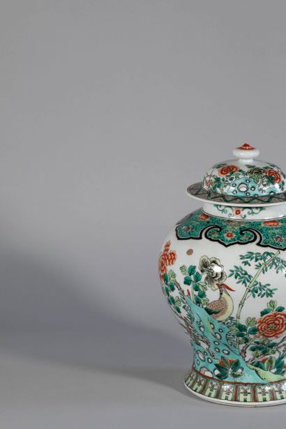 null China, 19th century. Polychrome enamelled porcelain vase decorated with flowering...