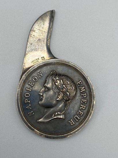 null CHRISTOFLE. Silvered bronze paper cup representing on the obverse the effigy...