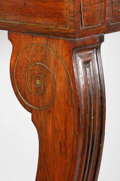 null Mahogany and mahogany veneer CONSOLE with geometrical decoration of brass fillets...