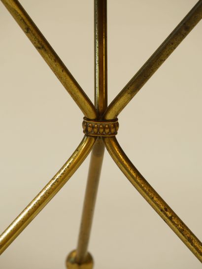 null 
Small round table or tripod pedestal table forming an end of sofa in gilded...