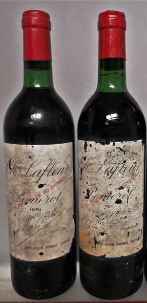 null 
2 	bouteilles 	Château LAFLEUR - Pomerol	 1981. 	Etiquettes tachées et abîmées....