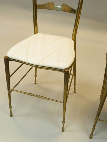 null Manufacture CHIAVARI

Paire de chaises à haut dossier ajouré en laiton doré

patiné...