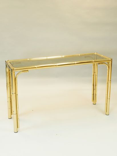 null 
Maison BAGUÈS (Attribué à)

Table console à structure en laiton doré à l’imitation...