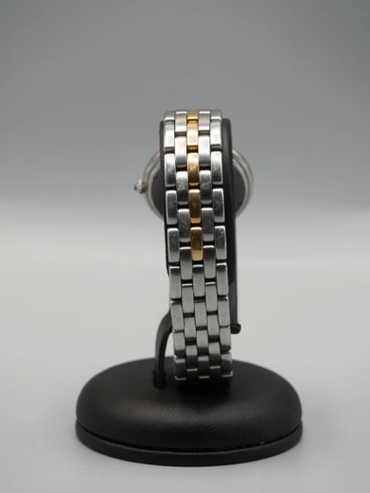 null 
CARTIER. Montre bracelet femme, modèle Panthère ronde en acier et or jaune,...