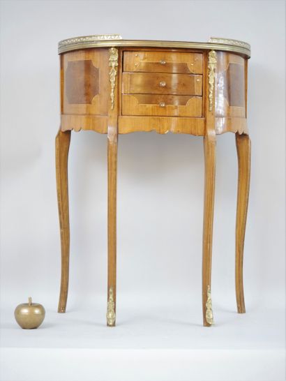 null Small half-moon shaped flying table, resting on four finely curved legs, opens...
