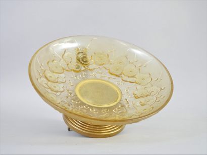 null An Art Deco style bowl, the gilt metal base surmounted by cylindrical motifs...