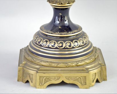 null PARIS, A rich GARNITURE in the Sèvres style, composed of a pair of covered VASES

and...