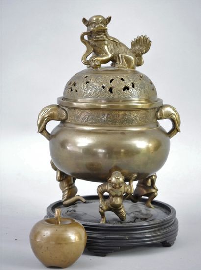 null Indochina, 20th century. Bronze tripod perfume burner, lid with dragon and Fo...