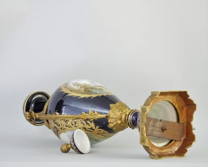 null PARIS, A rich GARNITURE in the Sèvres style, composed of a pair of covered VASES

and...