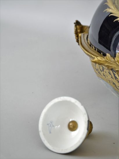 null PARIS, A rich GARNITURE in the Sèvres style, composed of a pair of covered VASES

and...