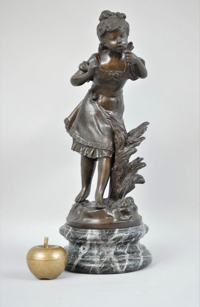 null Augustin MOREAU (1834-1917) Girl with a bird. A bronze proof with brown patina...