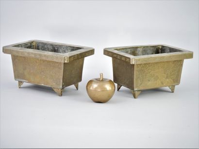 null China, 20th century. A pair of chased bronze planters decorated with bamboo...