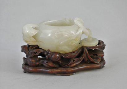CHINA, 20th century

White celadon jade brush...