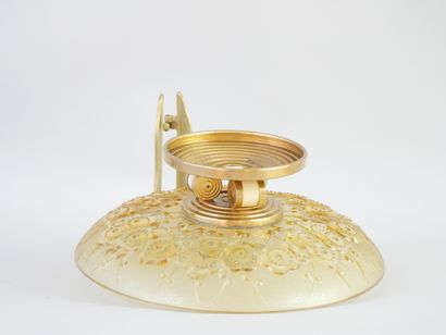 null An Art Deco style bowl, the gilt metal base surmounted by cylindrical motifs...