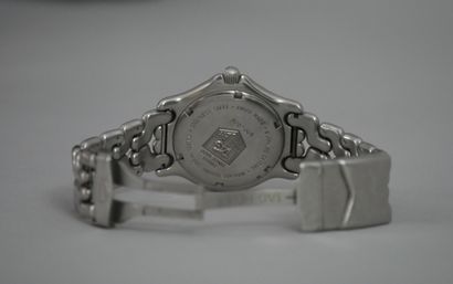 null TAG HEUER. Steel wristwatch, grey dial with baton markers, date display at 3...