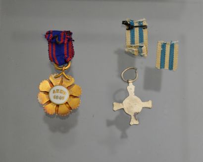 null Vatican. Lot of two decorations in reduction including a cross of the order...