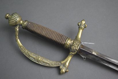 null Legitimist souvenir sword composed of a triangular steel blade engraved at the...