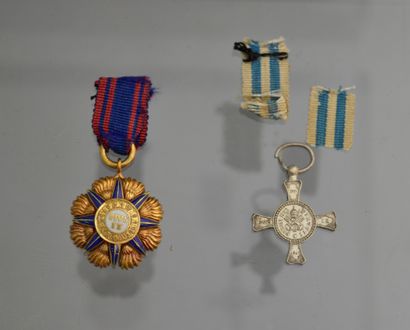 null Vatican. Lot of two decorations in reduction including a cross of the order...