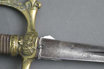 null Legitimist souvenir sword composed of a triangular steel blade engraved at the...