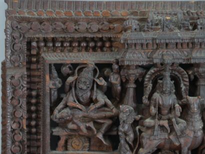 null INDIA, 19th century. Openwork panel carved with a frieze of deities bordered...