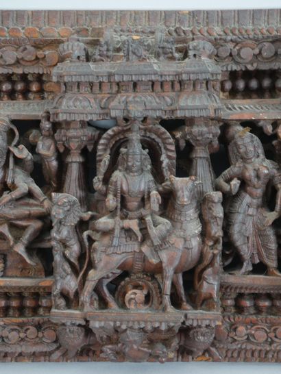 null INDIA, 19th century. Openwork panel carved with a frieze of deities bordered...