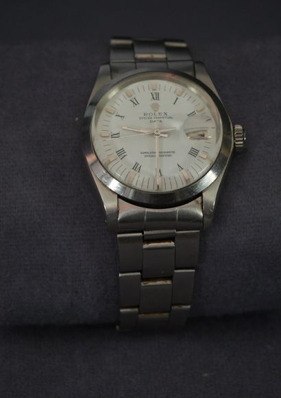 null ROLEX. Men's wrist watch, Oyster Perpetual model, Date. White dial with

black...