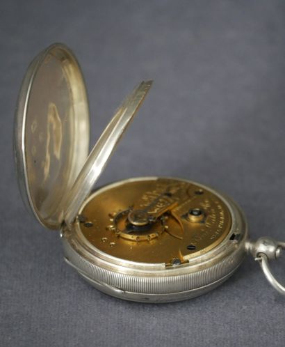 null Silver gousset watch decorated with a shield surrounded by the garter on a guilloche...