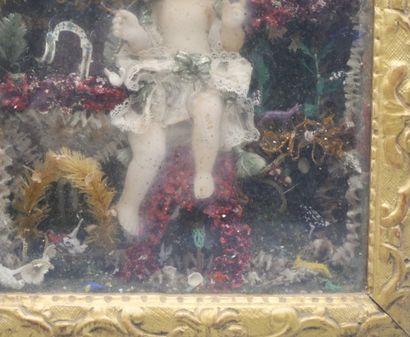 null DIORAMA featuring the Infant Jesus in a plant and mineral environment.
The Child...