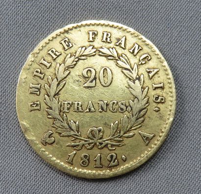 null Pièce de 20 Francs or à 900°/00 Napoléon Empereur, tête laurée 1812
 Atelier:...