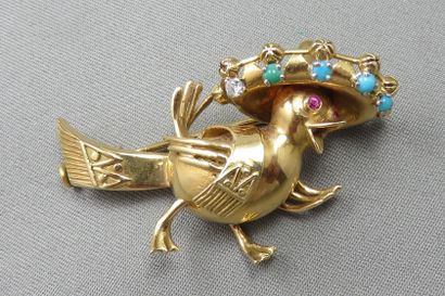 null Brooch in gold 750°/00 and platinum, stylizing a duck wearing a Mexican hat,...