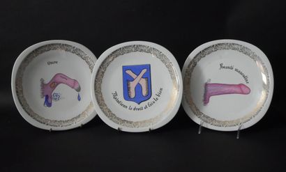 null Set of three porcelain plates with erotic subjects in the style of Albert Dubout....