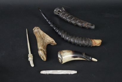 null Lot comprising five phallic objects:
-a carved antelope monache cigar cutter.
-A...