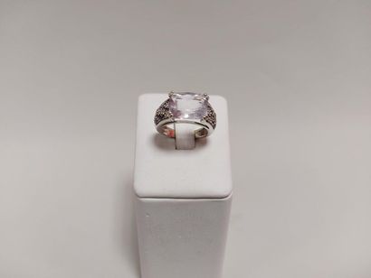 null MUBOUSSIN. Platinum ring set with a rectangular amethyst set with a paving of...