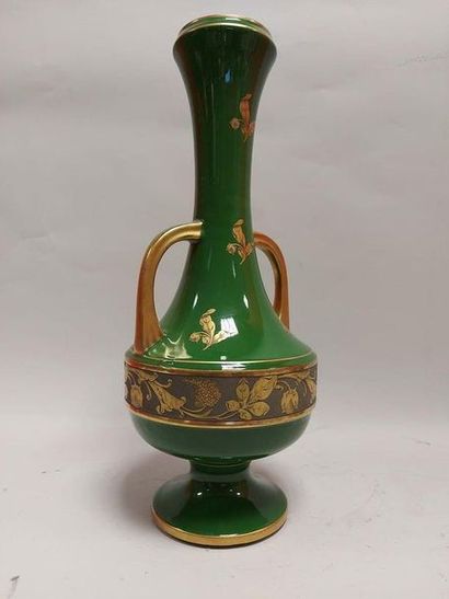 null JAGET PINON to TOURS. Ceramic vase with gold decoration on a green background....