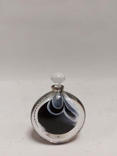 null ALLEX, XX-XXI. BLOWED GLASS BOTTLE with oval section decorated with white, black...