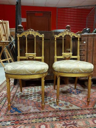 null Pair of Napoleon III period Louis XVI style FLAT BACKREST CHAIRS in gilded wood...
