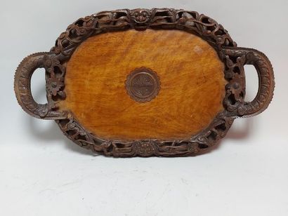null INDOCHINA. Carved mahogany tray with dragon decoration. Length: 59 cm