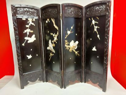 null ASIA. Folding screen with 4 leaves in carved blackened wood decorated with bone...
