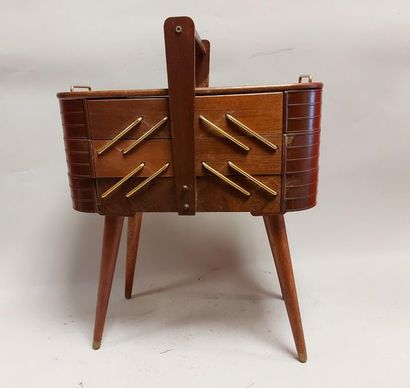 null Work table from the 1960s in teak, bakelite and brass. Height 56 cm