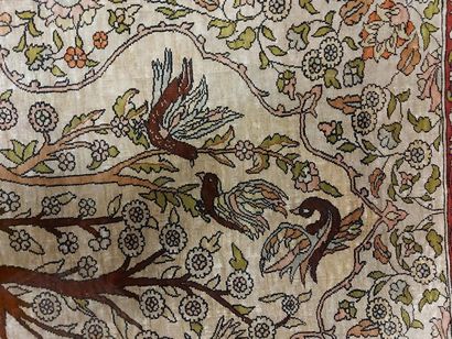 null THIN HEREKE RUG (TURKEY) in silk decorated with trees, animals and birds on...
