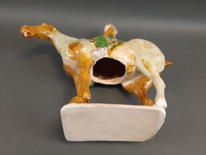 null 
CHINA, TANG period (618-907). Terracotta CAVALIERE with sancai glaze. H: 40...