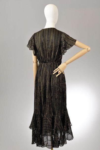 null *DVF - Diane Von Fürstenberg

Clothing set size XS comprising:

-Wrap dress...