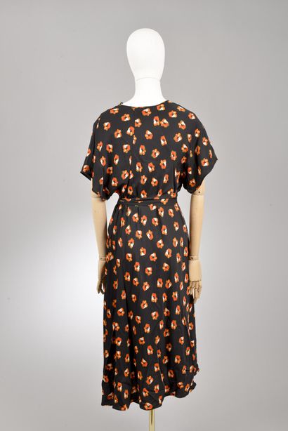 null * Diane Von Fürstenberg - DVF / Taille XXS

Ensemble comprenant:

-Robe portefeuille...