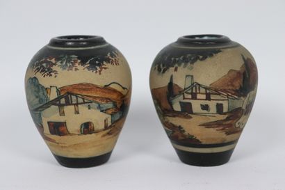 null CIBOURE.

Paire de vases en grès à décor de paysages basques animés.

L'un signé...