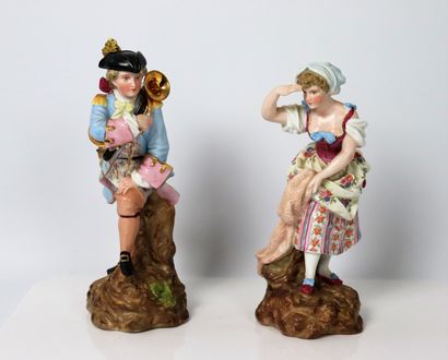 null ALLEMAGNE.

Paire de statuettes en porcelaine polychrome figurant un chasseur...