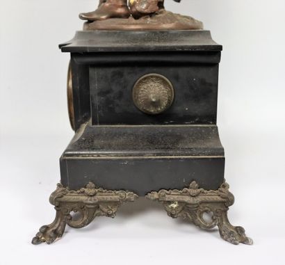 null Black marble clock with brown patina.

The sculpture after Auguste Moreau depicting...