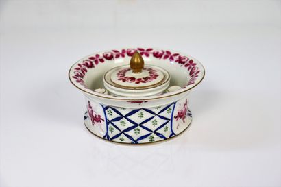 null Two polychrome porcelain inkwells, one circular in the Louis XVI style, the...