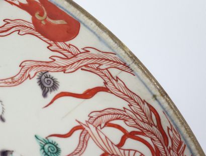 null JAPAN.

Large porcelain dish decorated with flowers, rosettes and phoenix.

Marked...